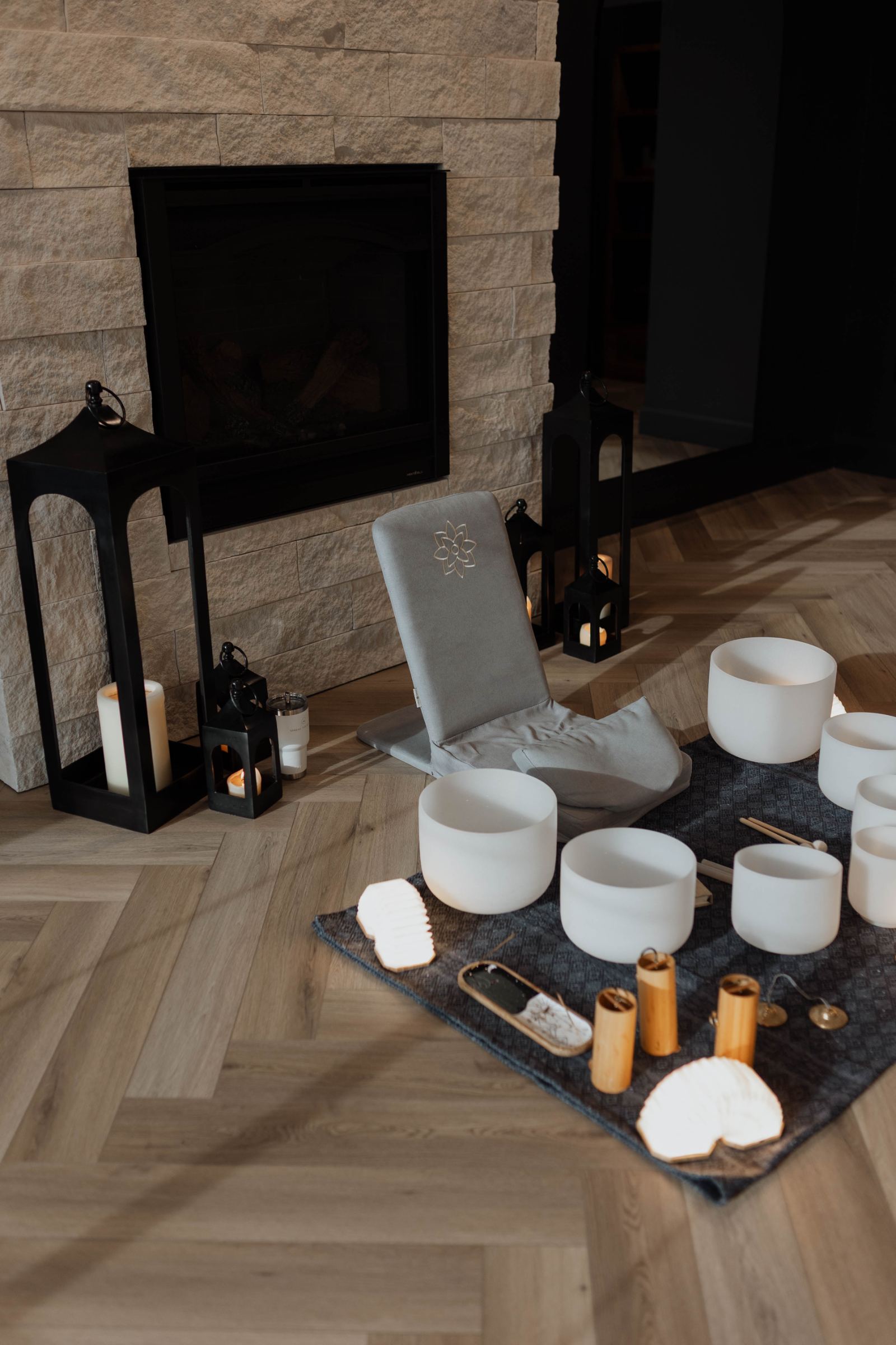 Sound bowl setup by the fireplace at the Spread the Health studio in Sioux Falls