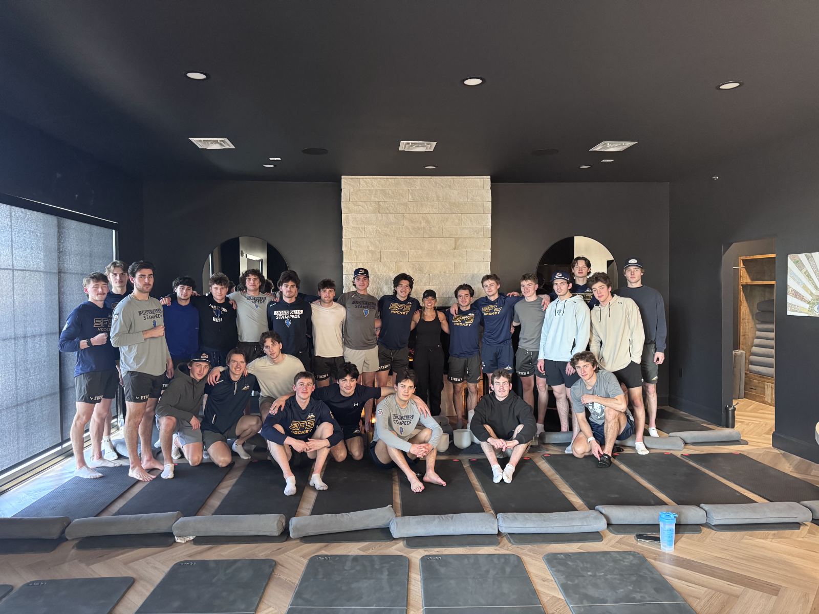 The Sioux Falls Stampede team after a breathwork session at the studio