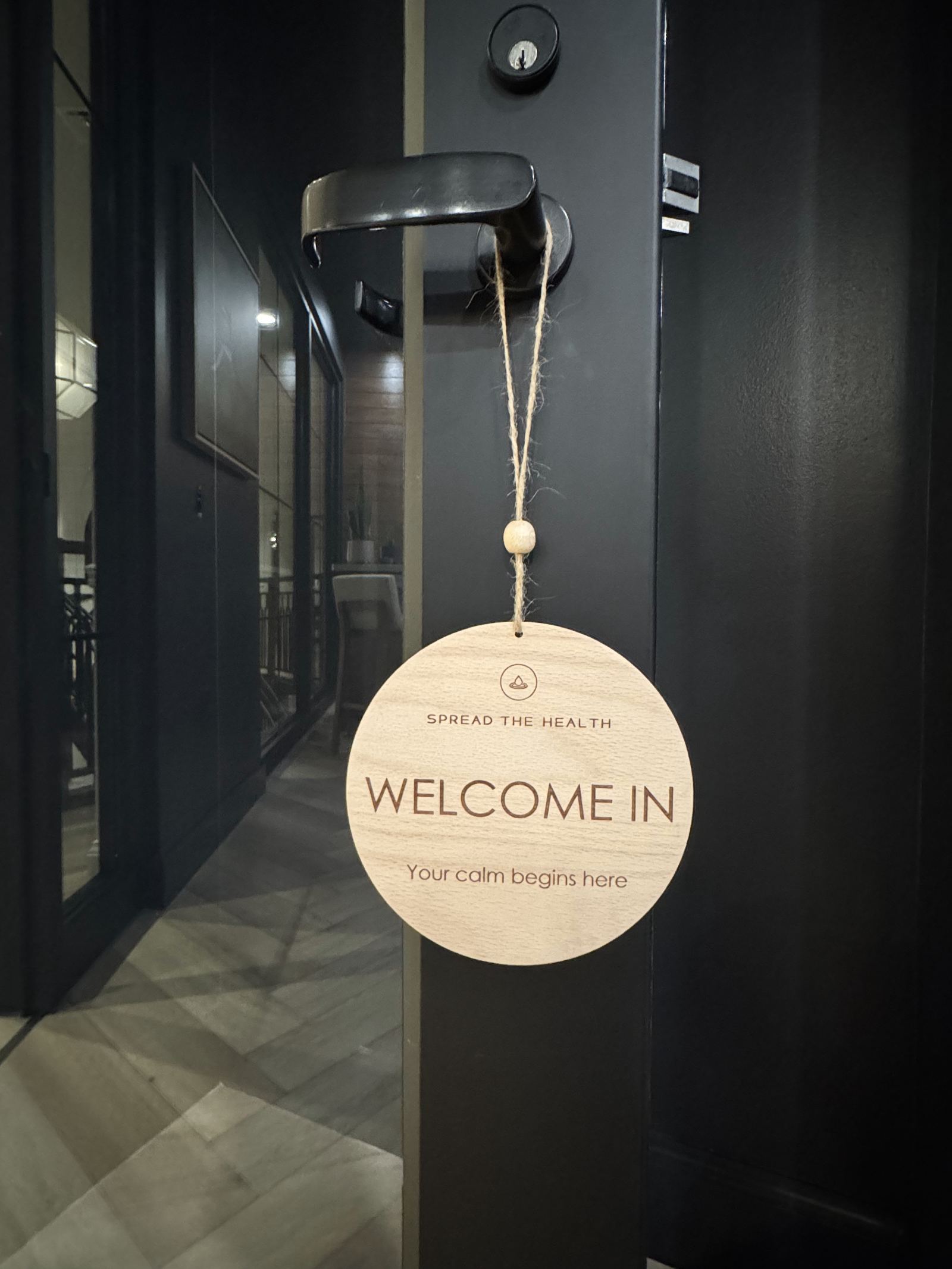 The Welcome In sign at the studio door